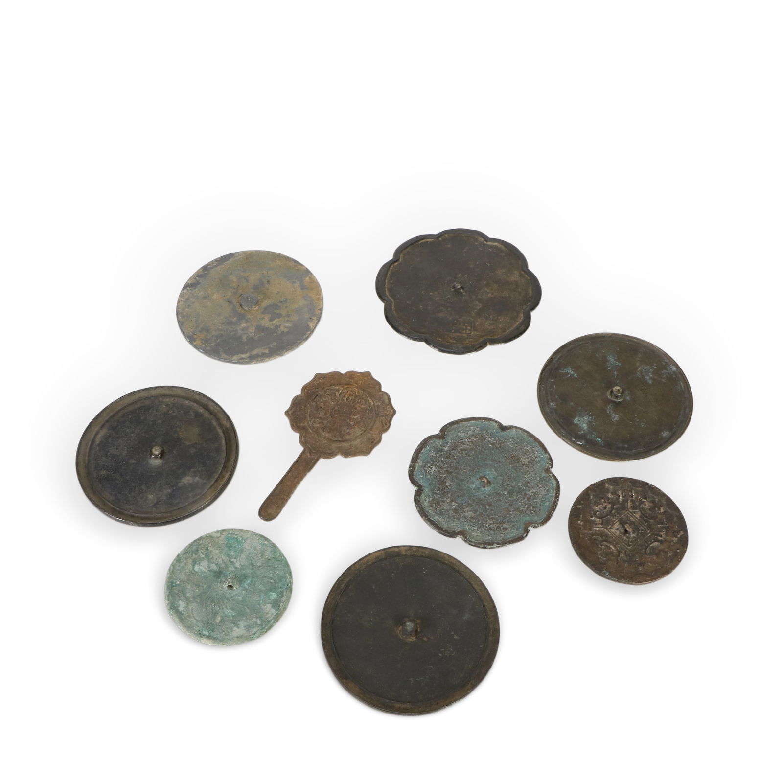 A set of nine bronze mirrors: A collection of bronze mirrors, there are nine of them.D:13.5cm??Various sizes??