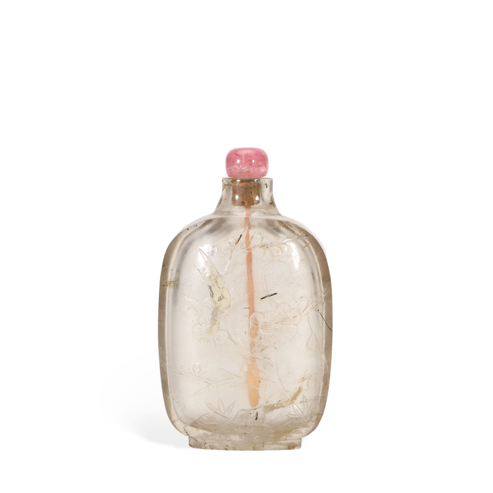 A crystal snuff bottle: A Chinese snuff bottle made of crystal, engraved with a subtle bamboo pattern.H:8 cm W:4.6 cm