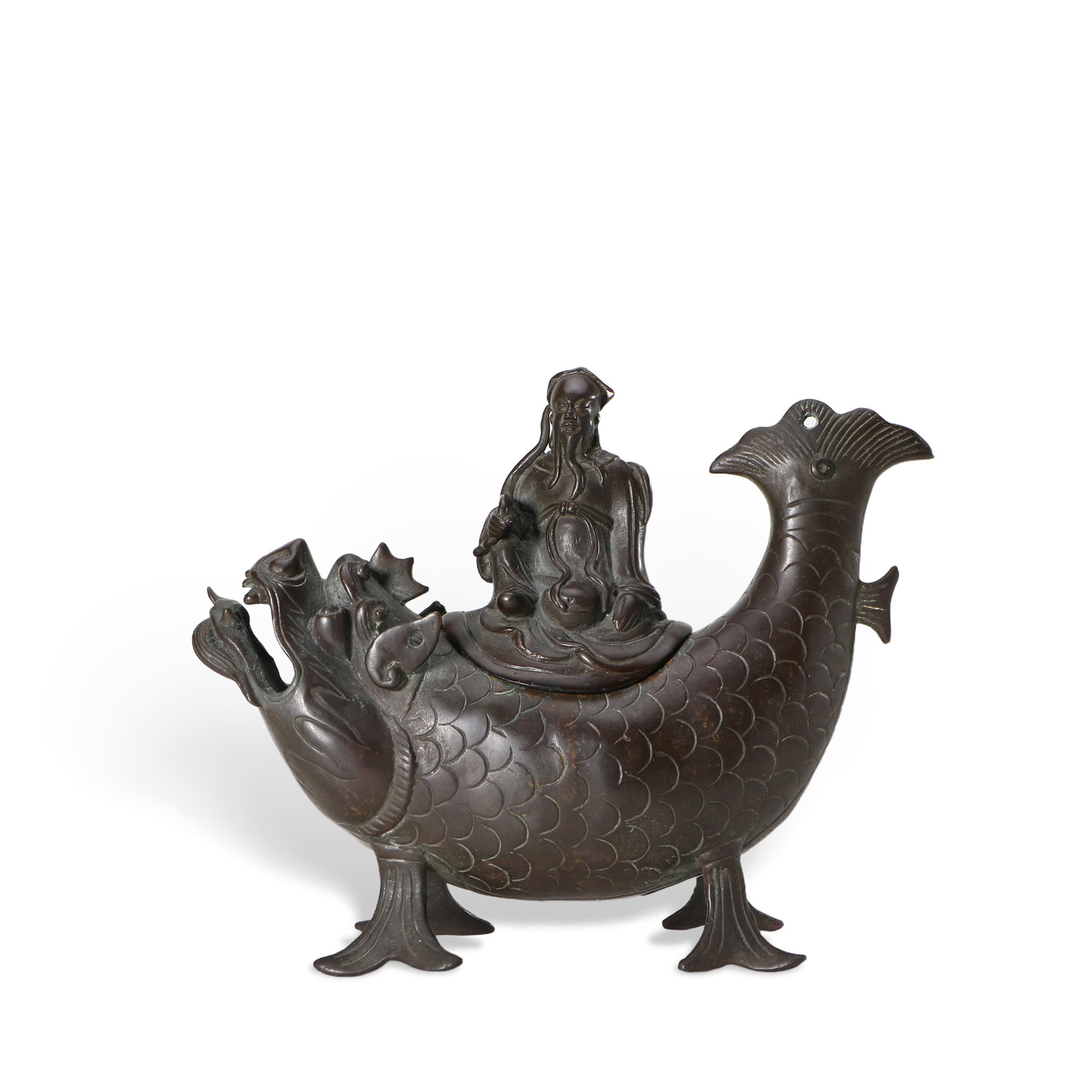 A Chinese bronze censer: An old man is sitting on a strangely shaped fish, 14.5 cm high, 17 cm wide, and 5 cm thick.