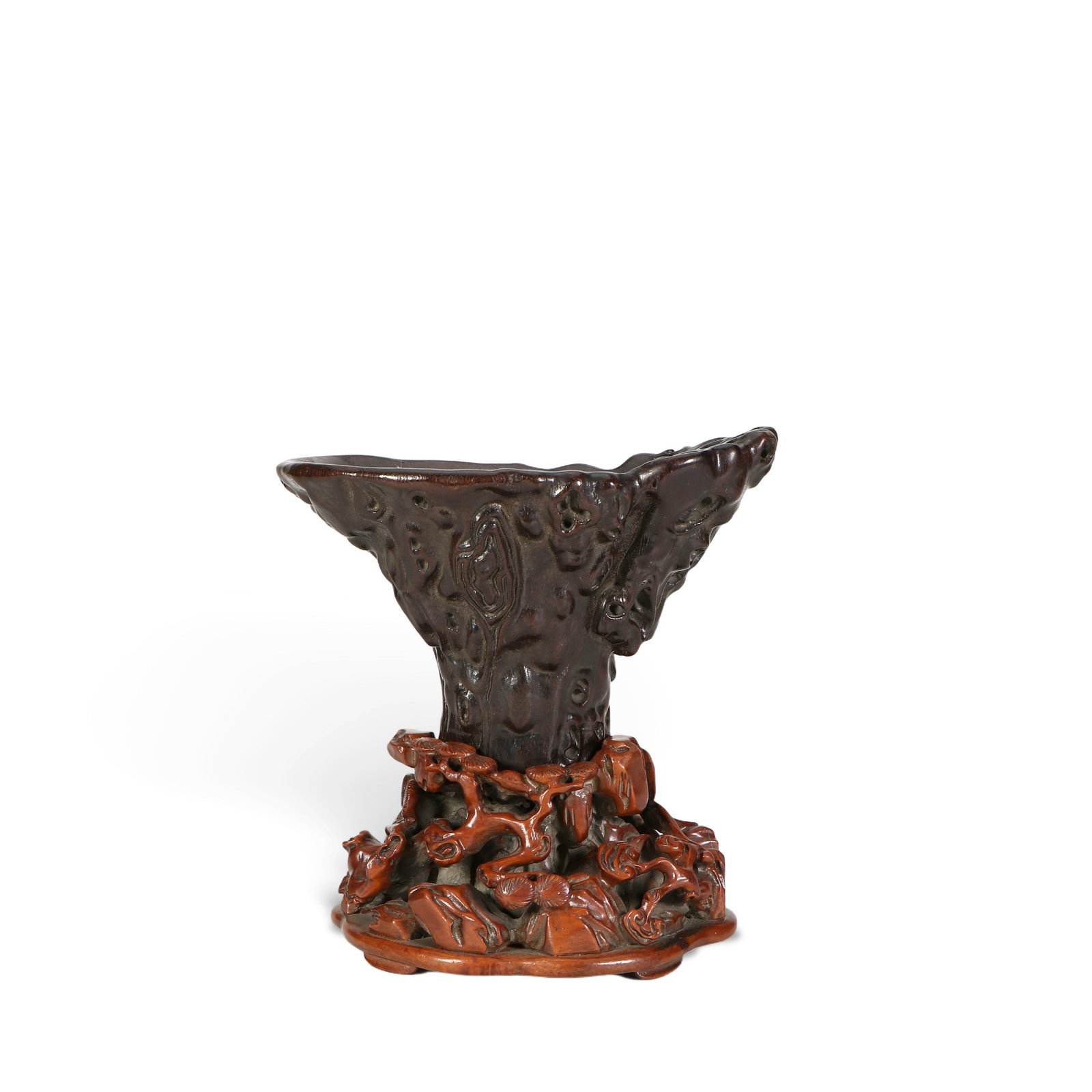 A Chinese wooden carved wine cup: The cup body and base are carved from two types of wood, with a total height of 14.5 cm. The wine bottle is 9 cm high, 13.5 cm wide, and 8.5 cm thick.