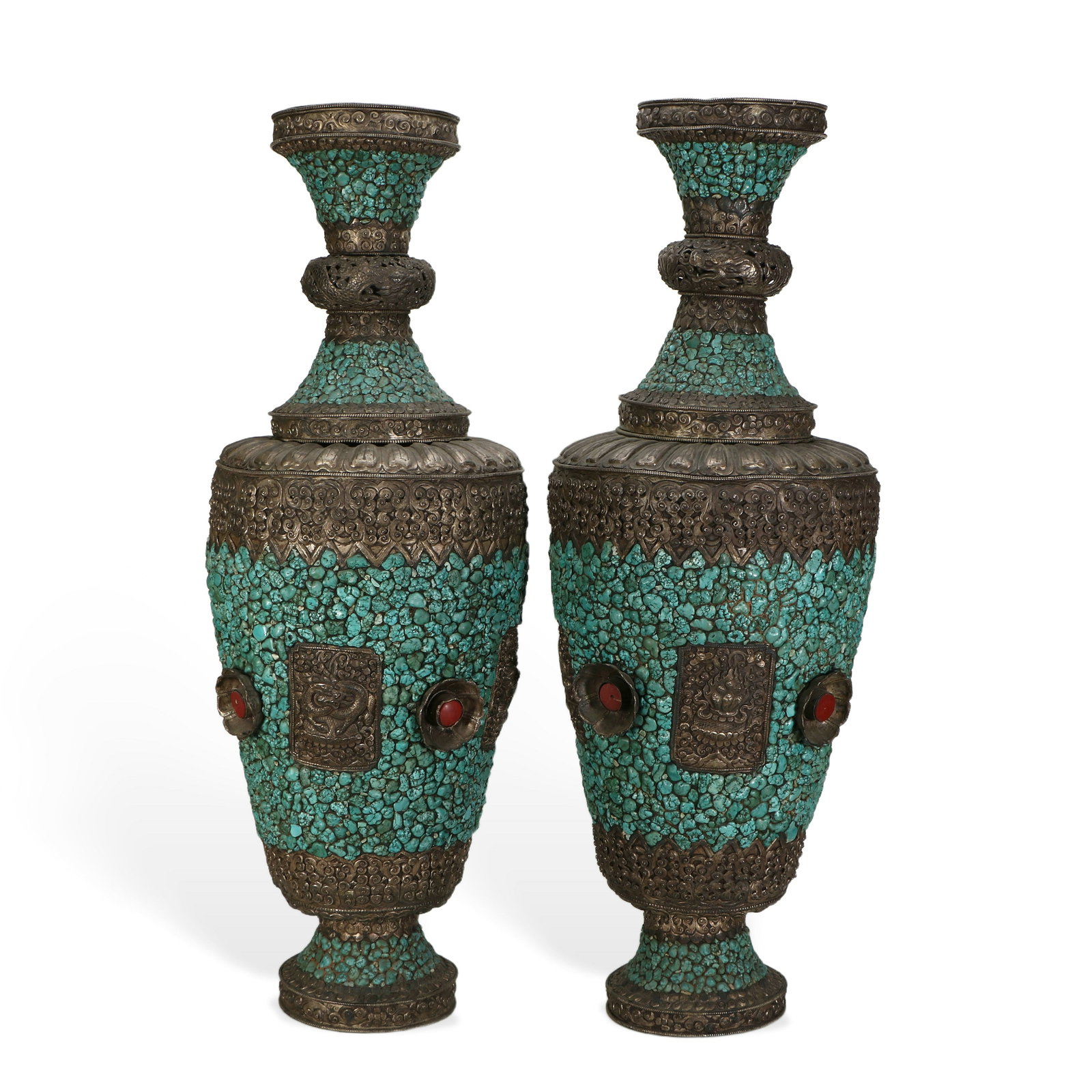 A pair of gilt-copper and silver vases: The body of the bottle is inlaid with a large amount of turquoise, 71 cm high, 24 cm in diameter at the belly, 14 cm in diameter at the mouth