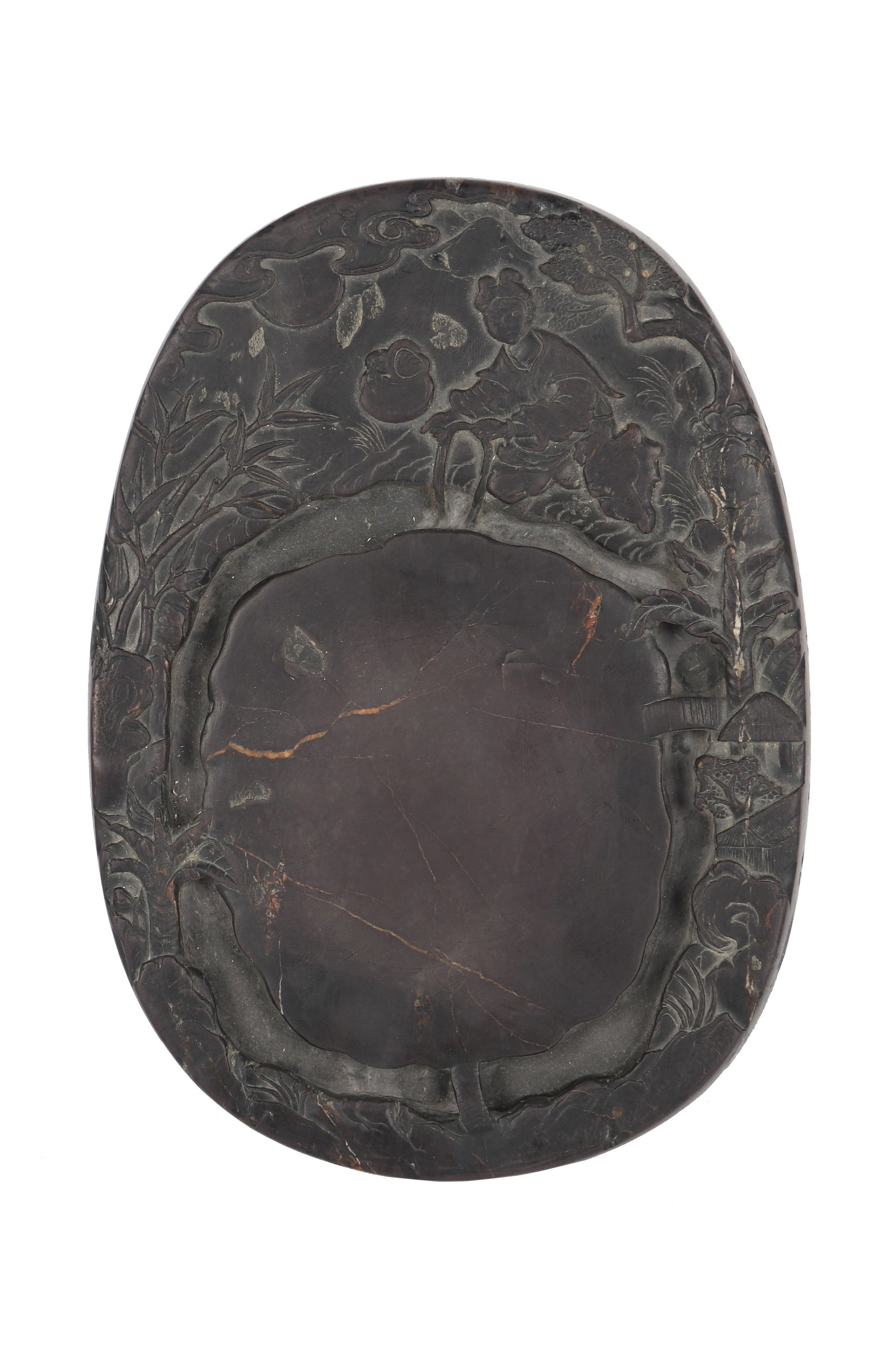 An Ancient Inkstone: An ancient inkstone. The inkstone is carved with figures and scenery, with deer and trees carved at the bottom, and poetry carved on the side. H: 5.5cm L: 16.7cm W: 12cm (Max)