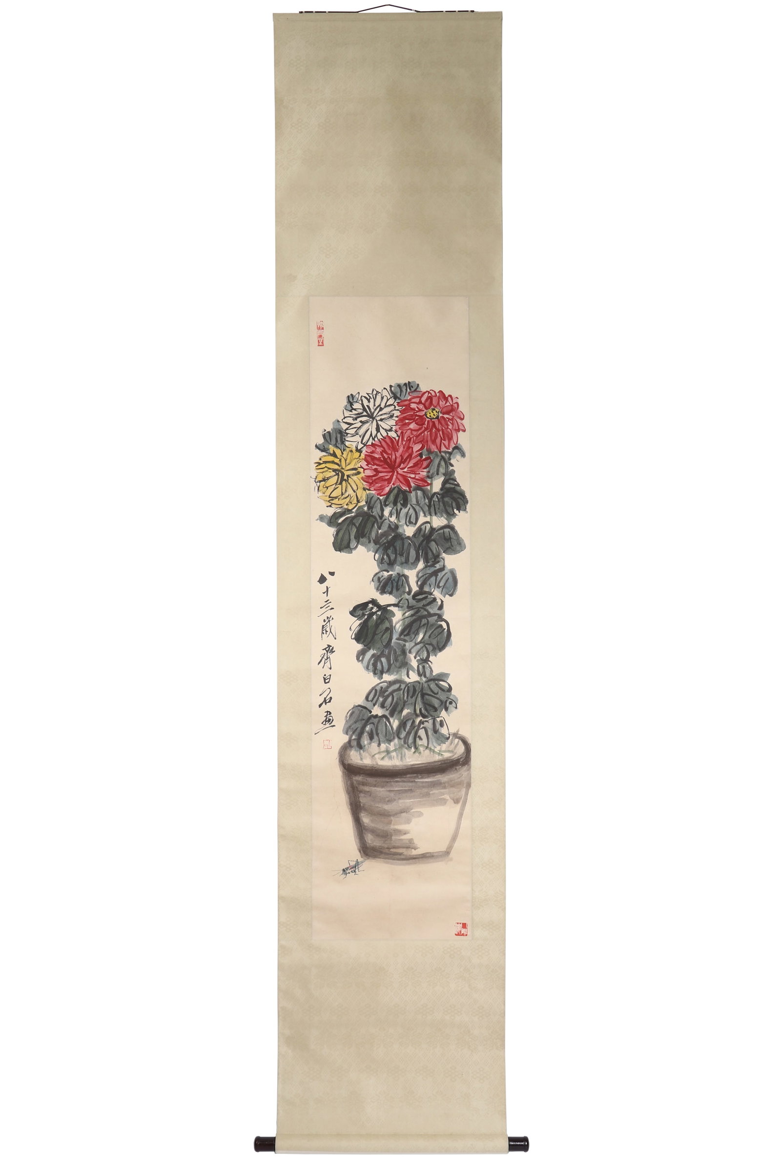 A Chinese Floral Painting, Signed by Qi Baishi: A Chinese floral painting, Signed by Qi Baishi, featuring three seals. Drawing A pot of chrysanthemums and a grasshopper in color on paper. Hanging scroll. H: 136cm W: 33.5cm (painting)
