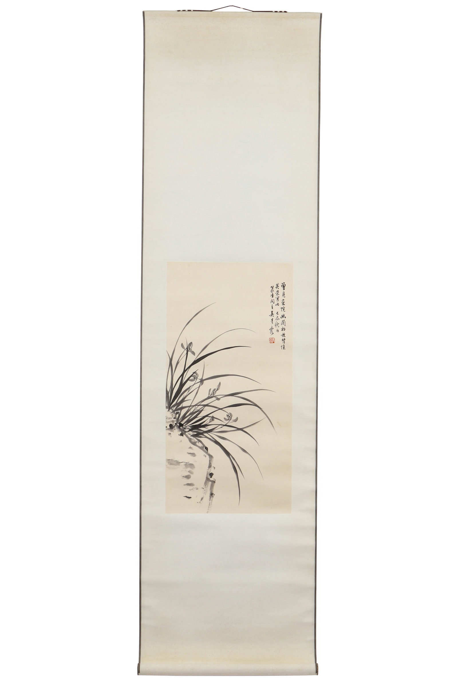 A Ink and Wash Flower Painting, Signed by Wu Qingxia: A ink and wash flower painting, Signed by Wu Qingxia, featuring a seal. Drawing some orchids and stones on paper with ink. Hanging scroll. H: 66.5cm W: 33.5cm (painting)