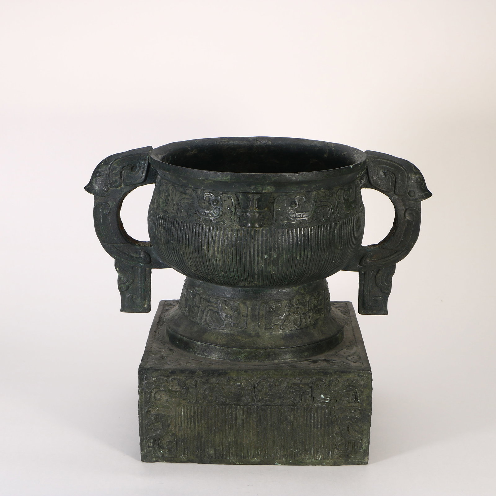 A bronze double-handled censer - 2