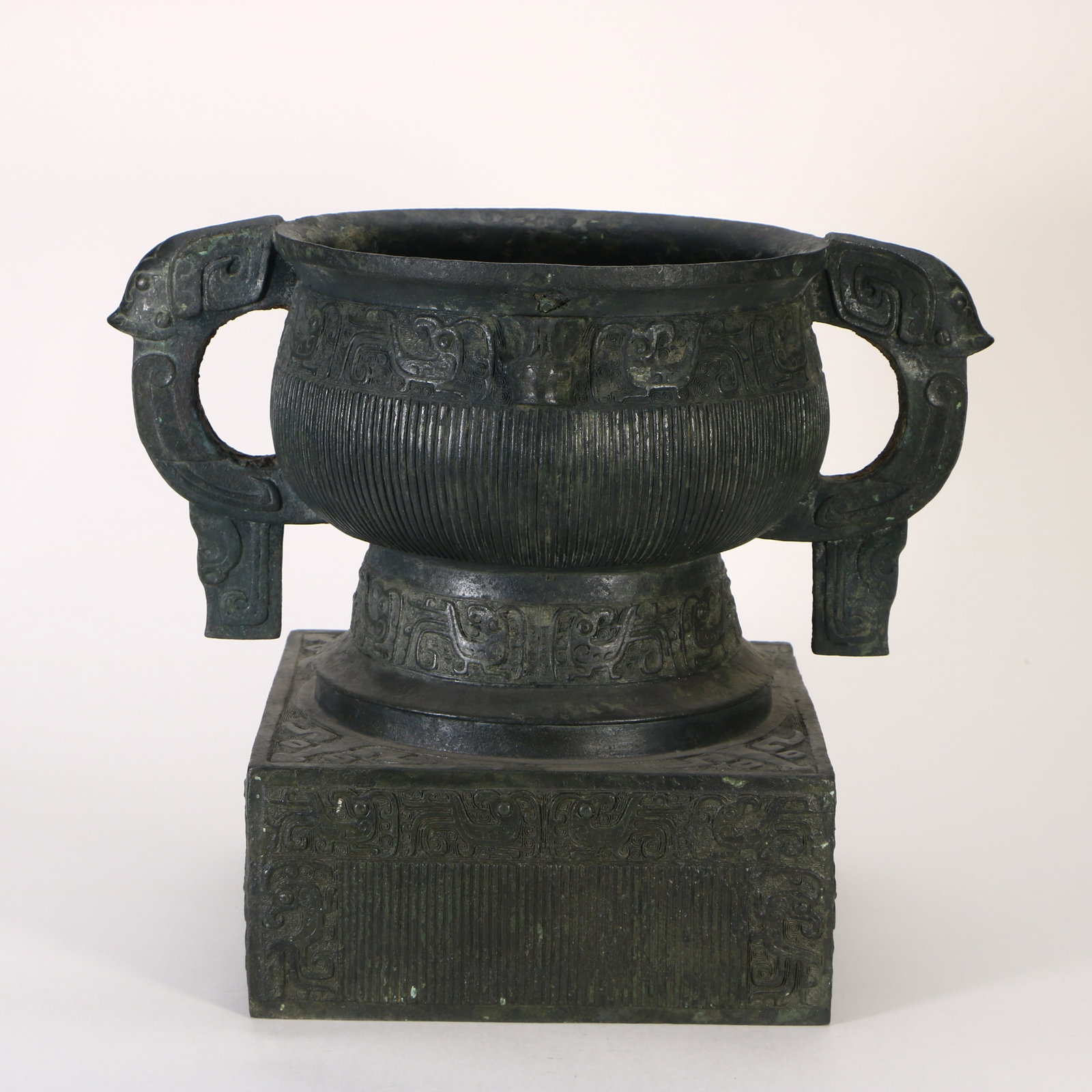 A bronze double-handled censer - 8
