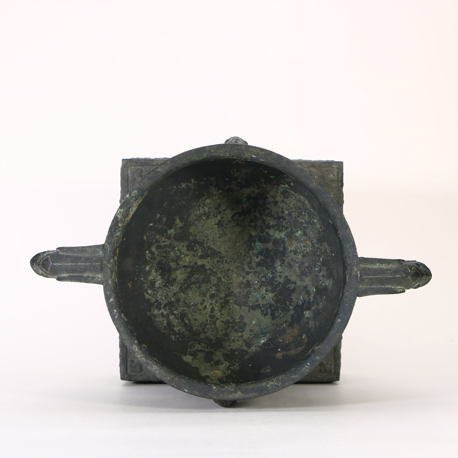 A bronze double-handled censer - 9