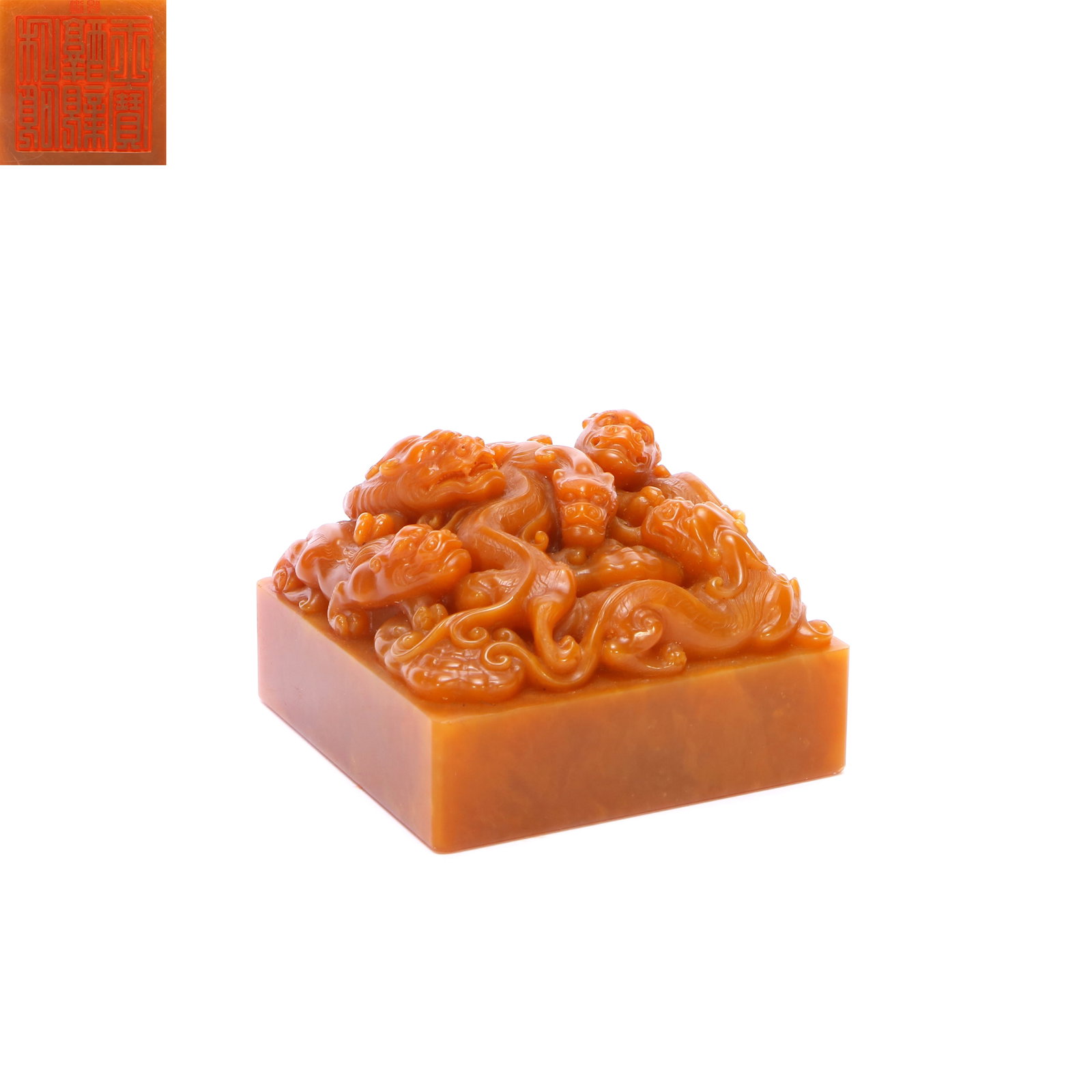A Tianhuang seal: The upper part of the seal is carved with several mythical creatures, 6cm high and 8.5cm long and wide.