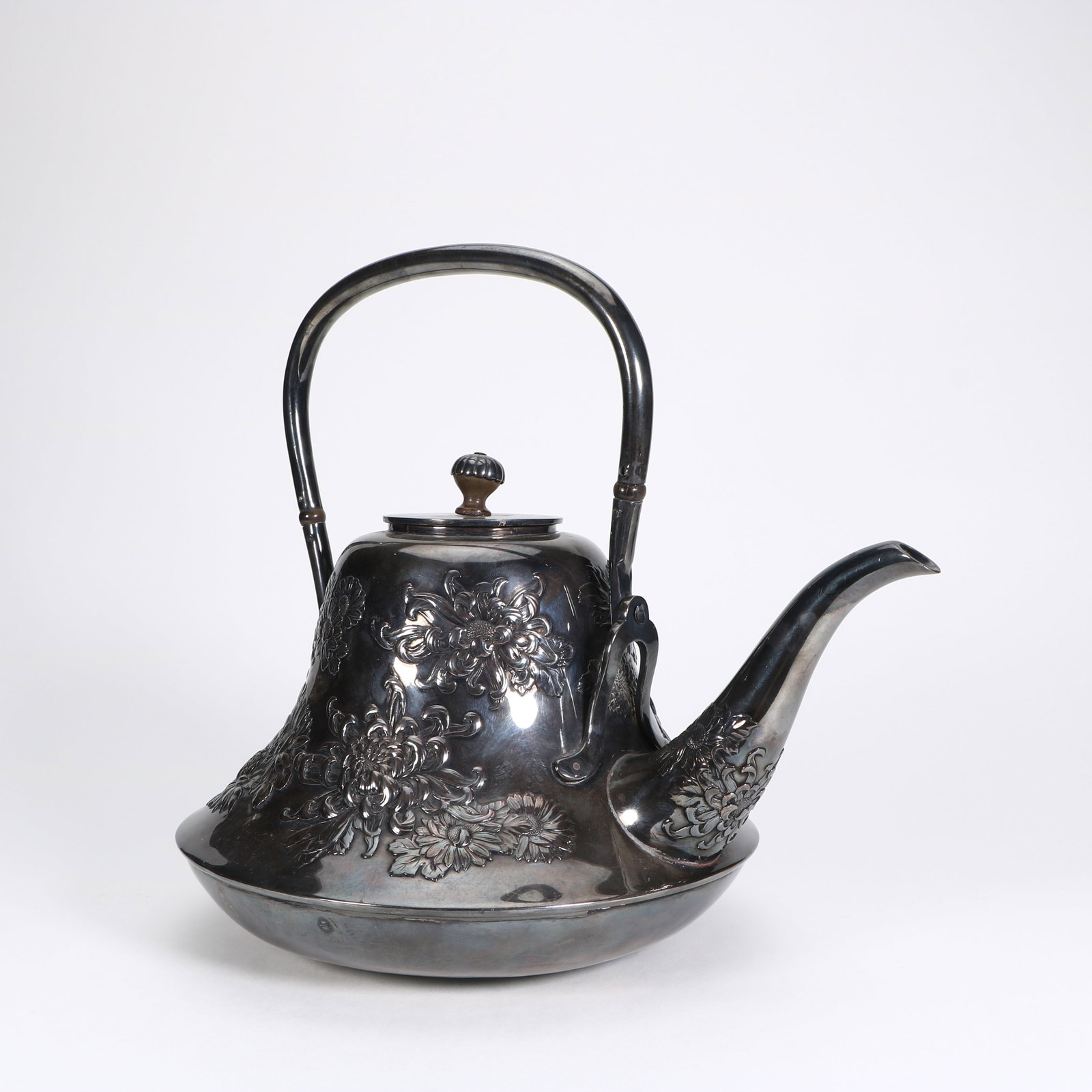 A silver kettle with a handle - 2