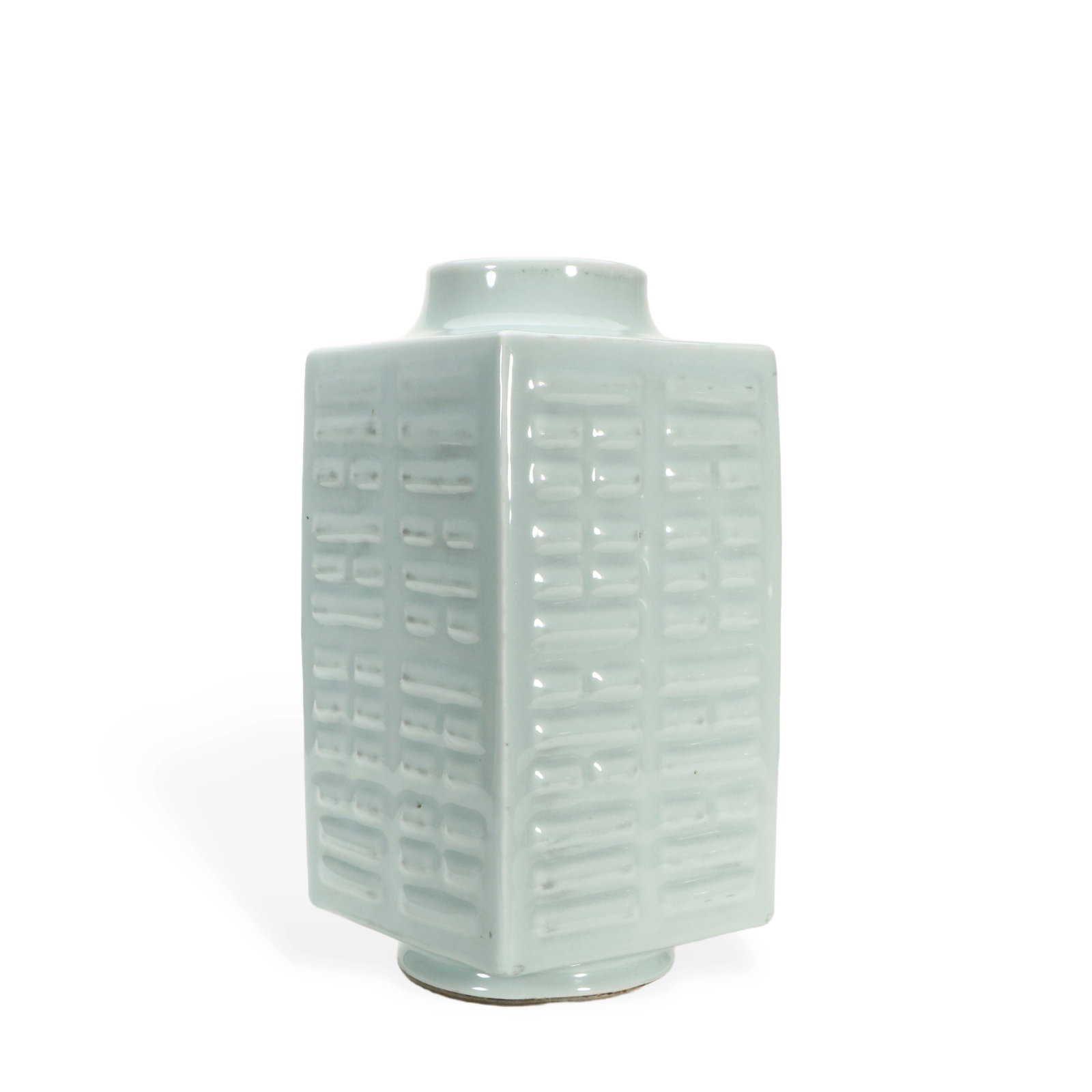 A Chinese celadon-glazed porcelain vase: The bottle has patterns all around, with a height of 28 cm, length of 13 cm, and width of 13 cm.
