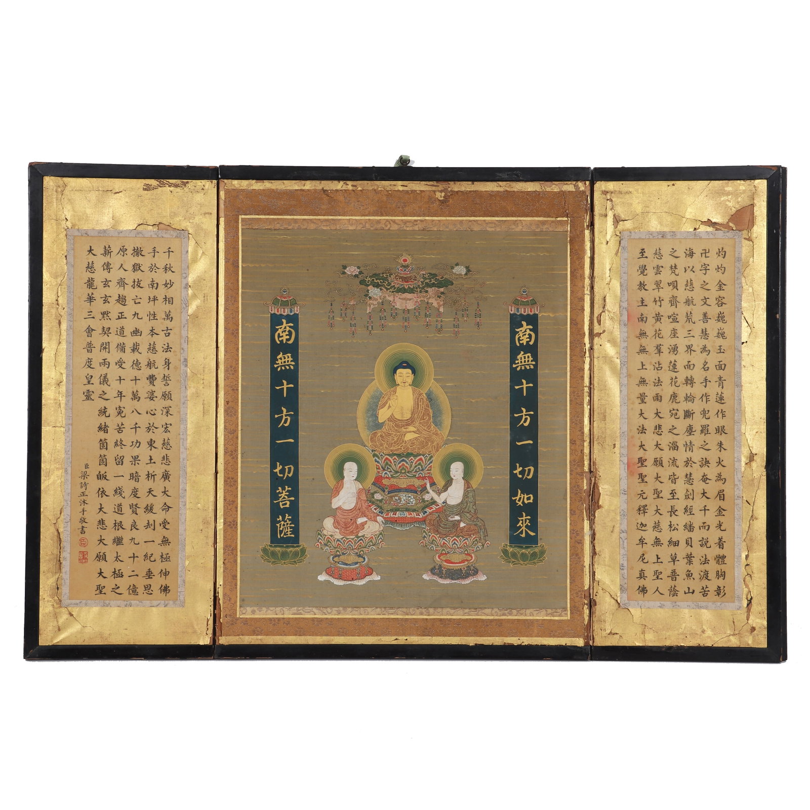 A Buddha statue painting with an inscription by Liang Shizheng: A painting of a Buddha statue, painted in color on silk. There are inscriptions and seals written by Liang Shizheng on both sides of the painting. There are two old labels from C. T. Loo Company on th