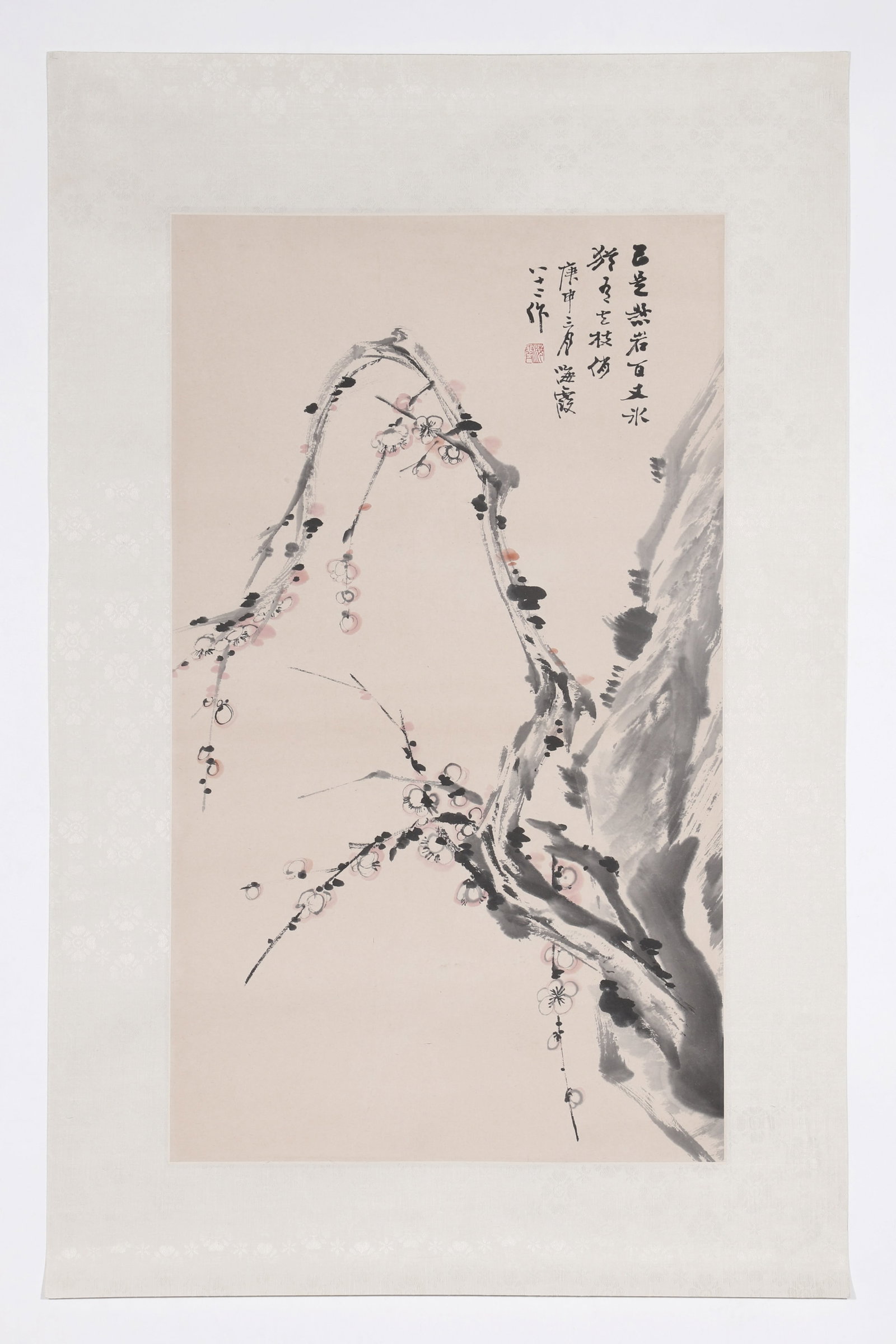 A Plum Blossom Painting, Signed by He Haixia: A plum blossom painting, Signed by He Haixia, featuring a seal. Drawing some plum blossoms on paper. Mounted in the form of mirror centers. H: 58cm W: 34cm (painting)