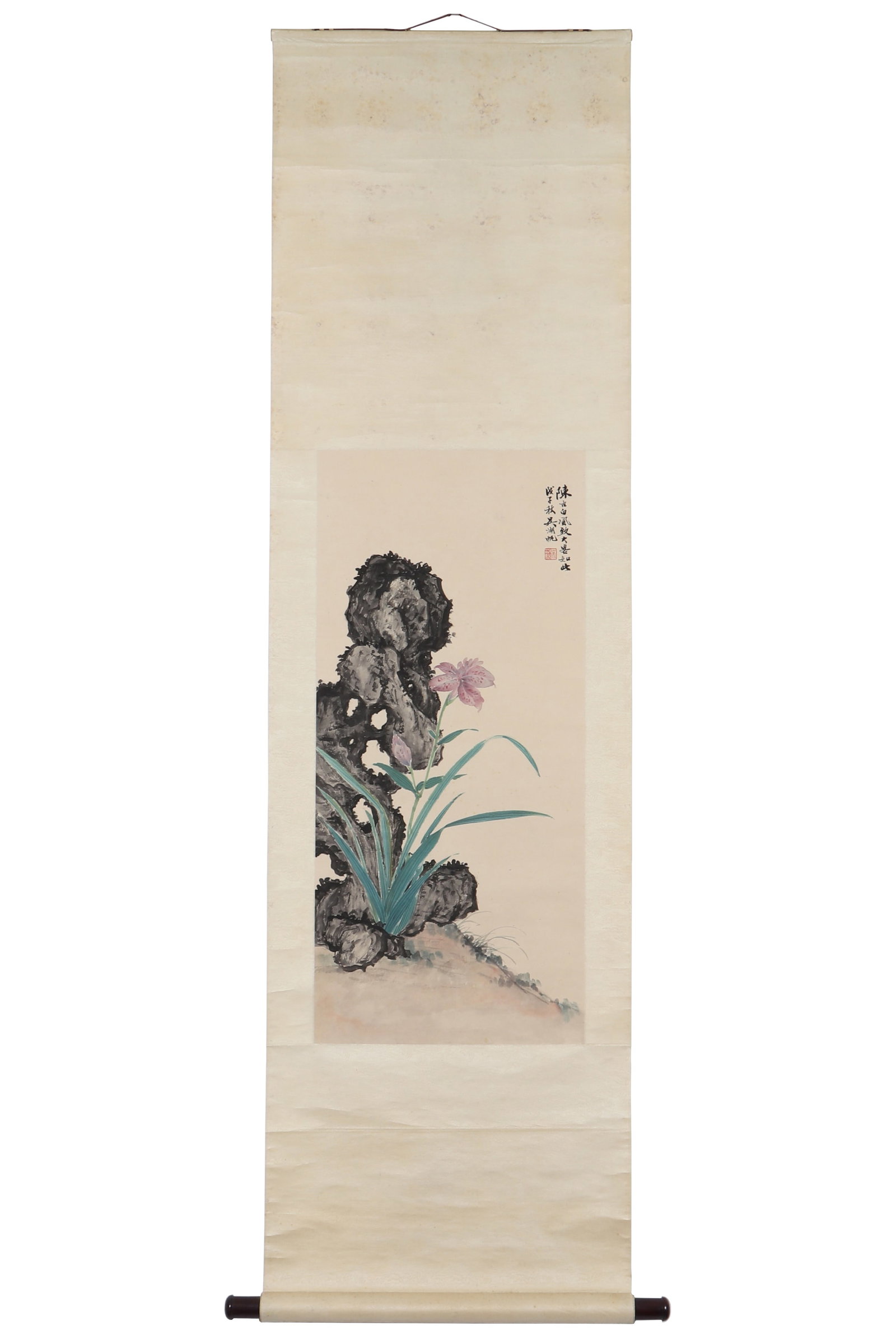 A Chinese Floral Painting, Signed by Wu Hufan: A Chinese floral painting, signed by Wu Hufan, featuring a seal, drawing orchids and stones on paper in color. Hanging scroll. H: 82cm W: 37cm (painting)