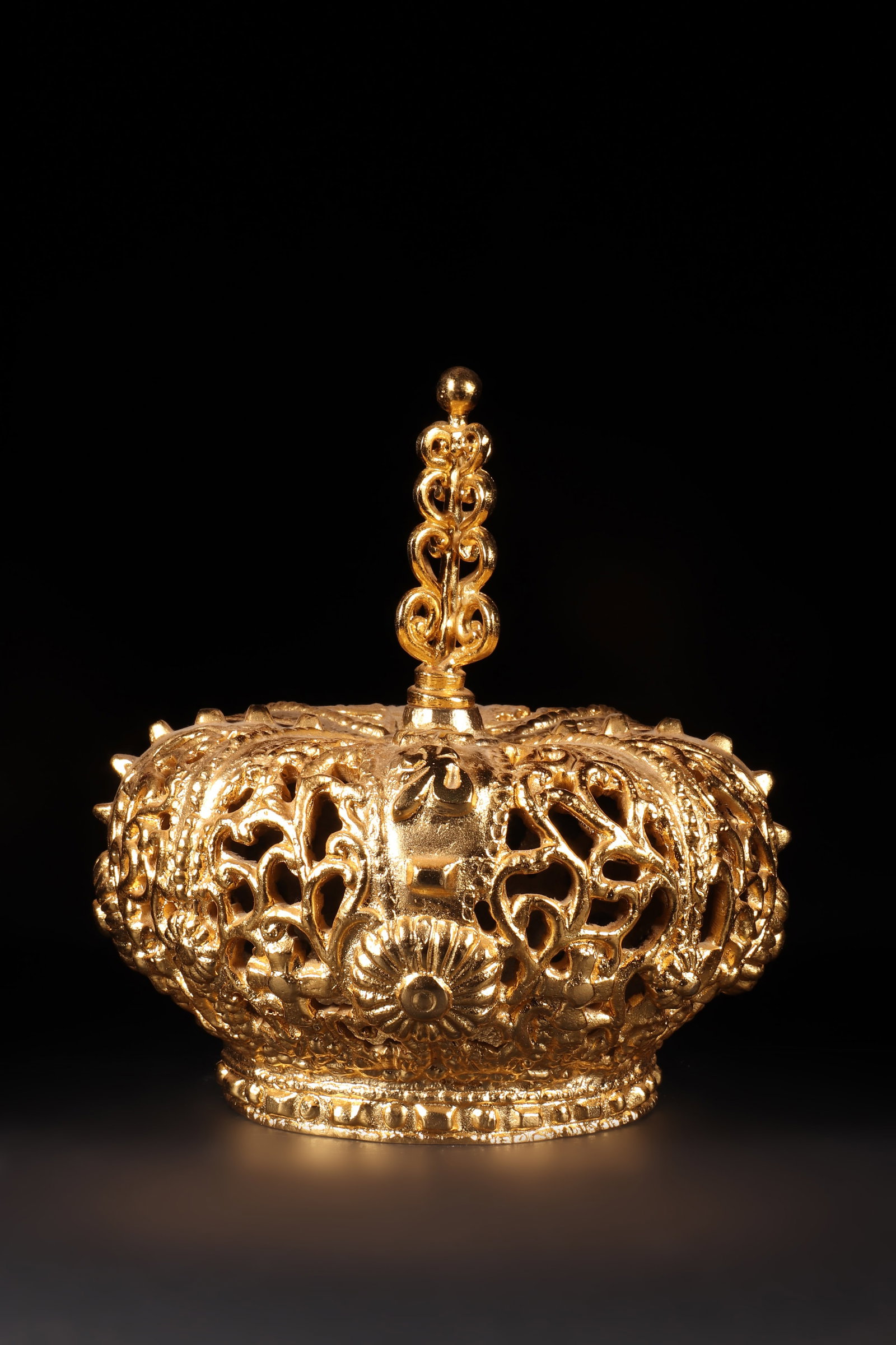 A Brass Crown: A brass crown, hollowed out and patterned with the words' Buddha Light '. H: 20cm D: 17cm (Max)