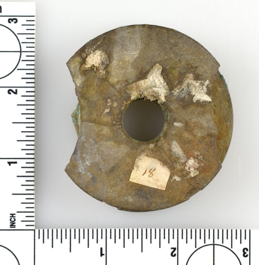 2 5/8" Spiro Ear Spool: Exceptional example from the Lincoln Smith collection, LeFlore Co., Oklahoma, Reported from the Temple Mound. Ex - Larry Johnson. Copper residue remaining on two faces.