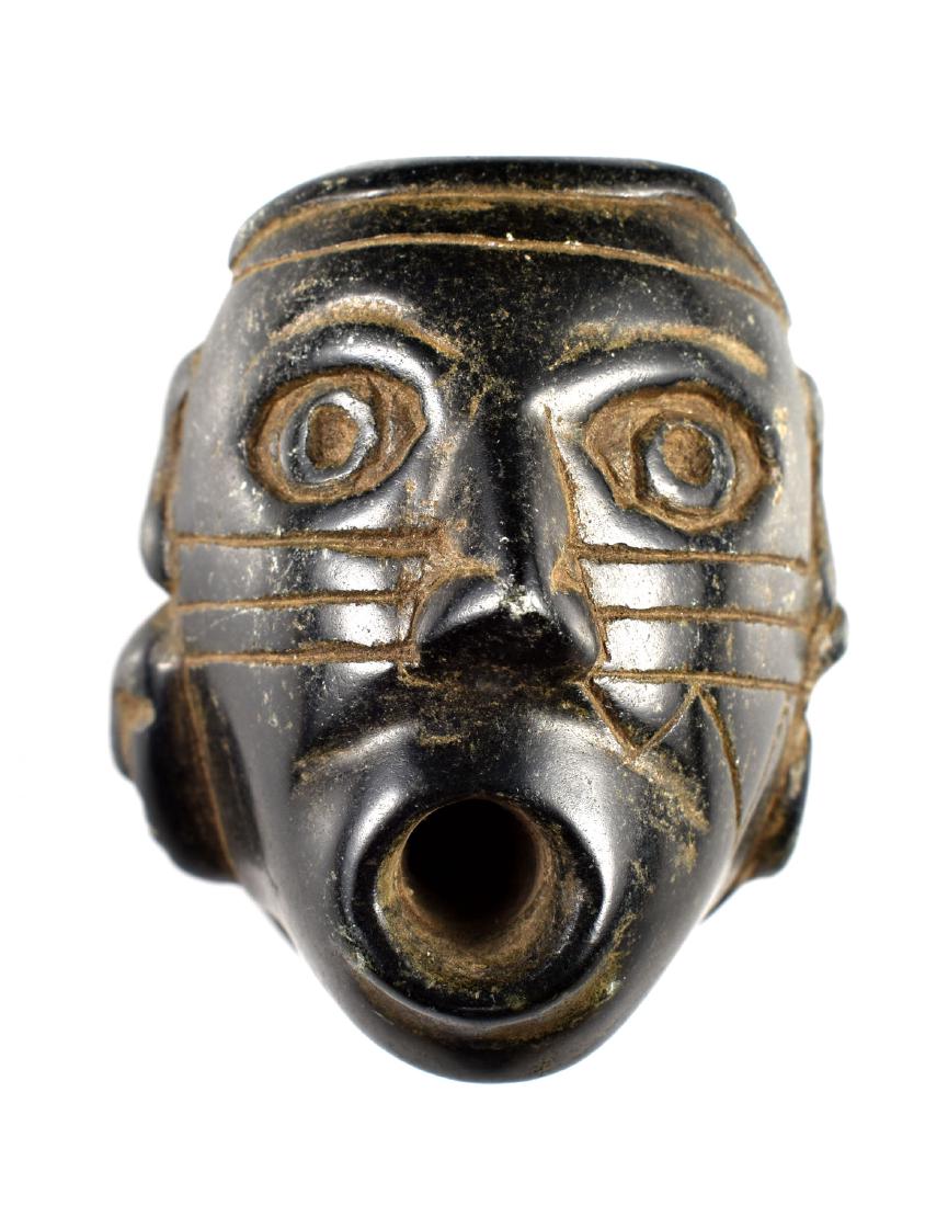PICTURED 2 3/4" Human Effigy Head Pipe: Nice example pictured on page 148 of Lar Hothem's Collector's Guide to Indian Pipes. Proto Historic example in black steatite. Likely a MicMac origin piece. Ex - Leveque Collection.