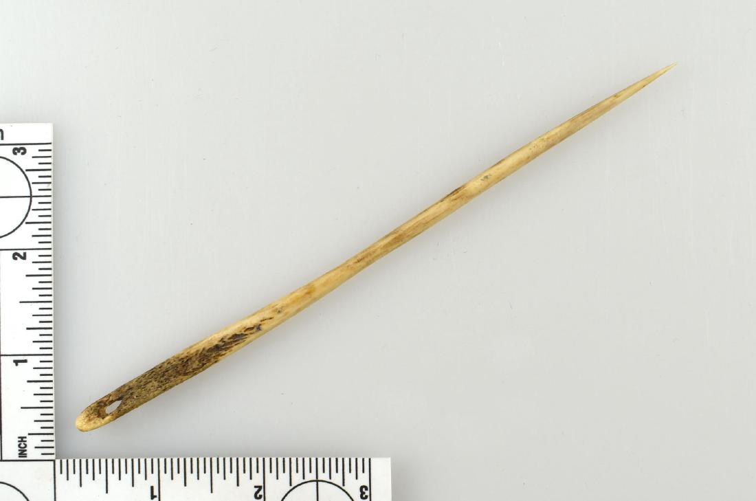 6 5/8" Bone Needle: Tennessee example formerly of the Larry Johnson and Lincoln Smith Collections. Fantastically slender example.