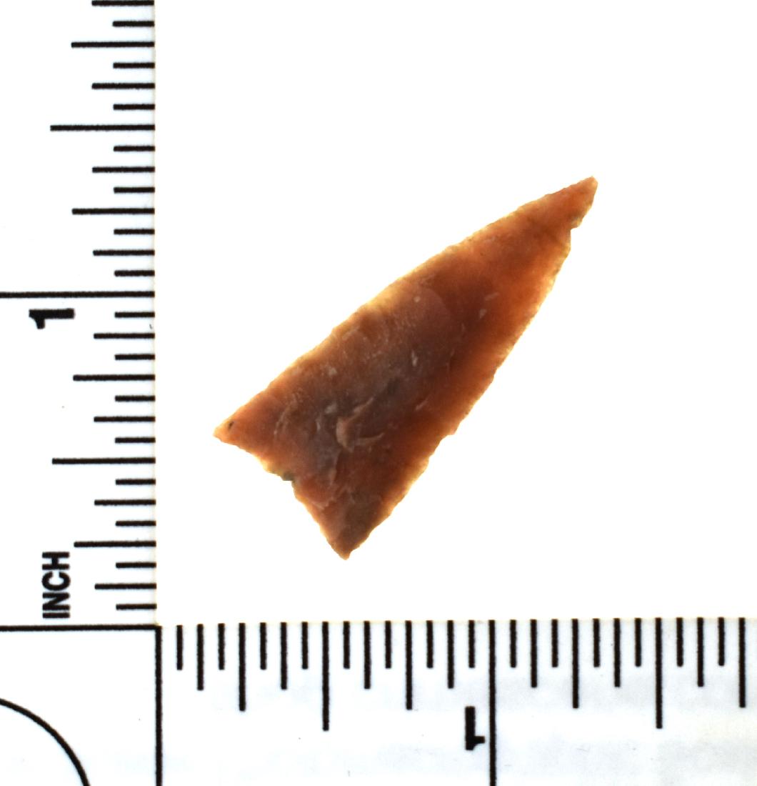 1 3/8" Cottonwood Triangle - Taylor COA: Wafer thin example from the high plains in a pink translucent chert. Found by Kevin Thorton in the Snake River area of Cherry Co., Nebraska. Ex - Andy Stebbing and Corky Thorton Collections. 