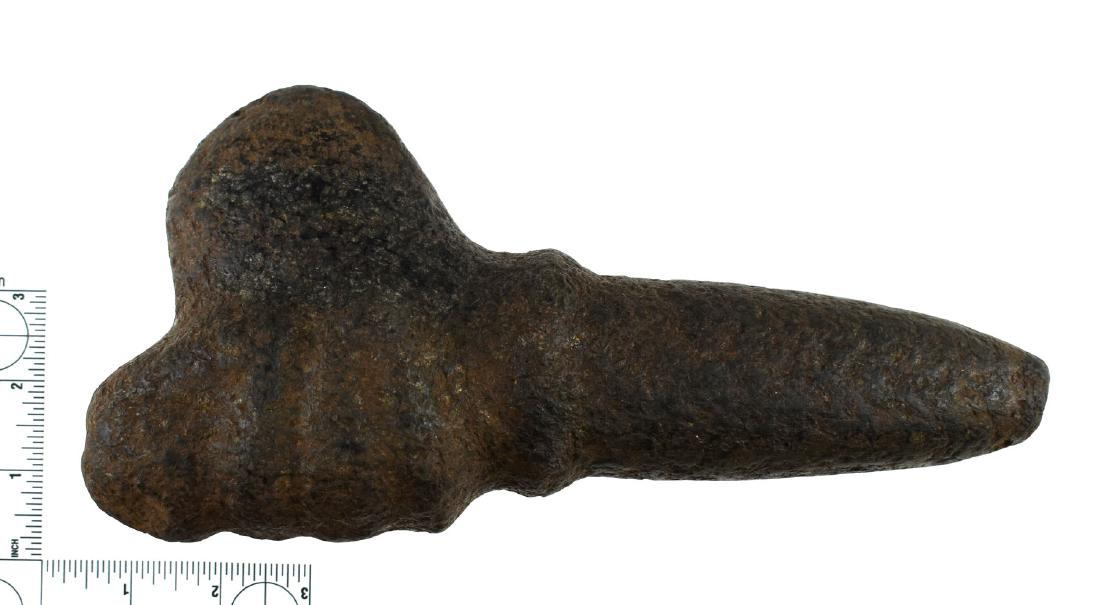 10 3/8" Taino Monolithic Effigy Axe: Fantastic example from the Caribbean made from a black dense stone. Animal effigy at top of handle.
