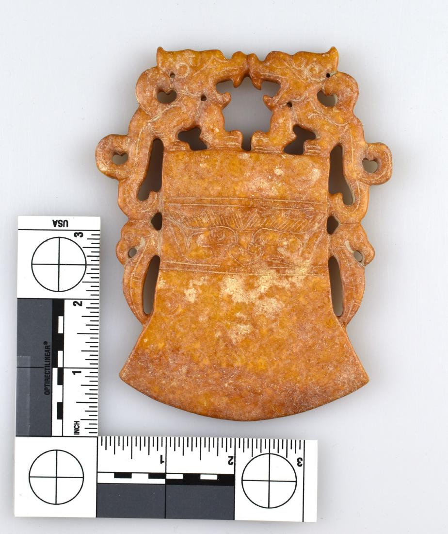 5 3/8" Chinese Carved Battle Ax Effigy: Orange jade-like stone example featuring two dragons. Exact age unknown.