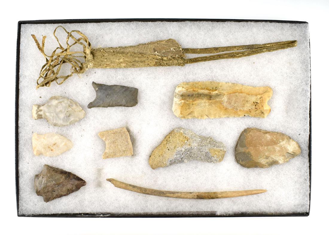 8x12 Display of Artifacts: Includes leather awl case, bone awl, various flint blades including two Paleo Bases.