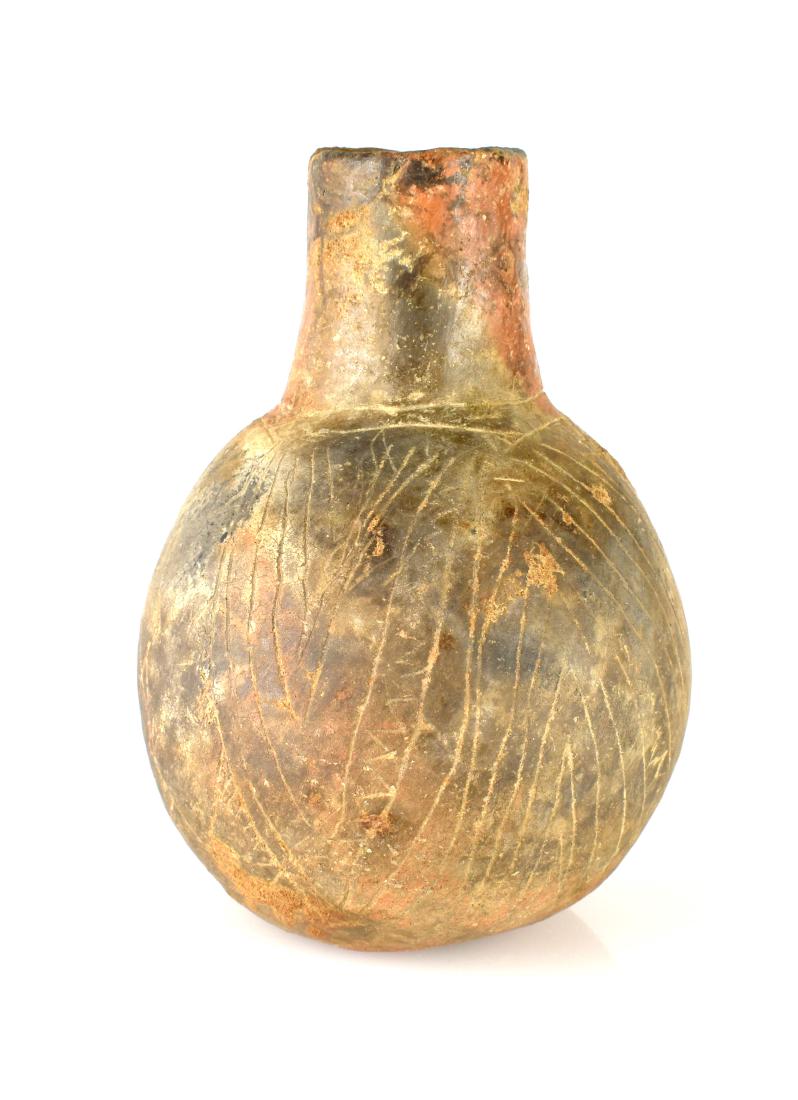5-3/4"x 4" Engraved Caddo Bottle: Nice example from Eastern Oklahoma covered with ochre and loaded with mineralization. Ex - Moon Collection.