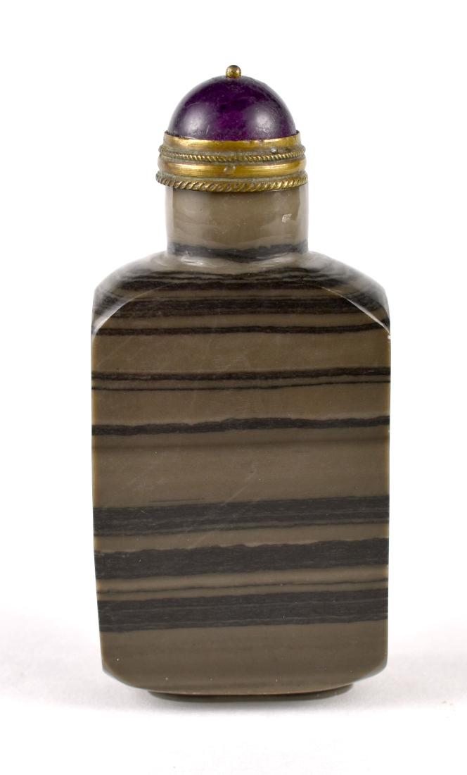 Beautiful Chinese Snuff Bottle: 3 1/8" tall. Weighs 90 grams. Showstopping 'eye appeal'. It has very distinguished looking Purple stone top / stopper with an ornate copper band and a traditional copper scoop. Fine old smooth po