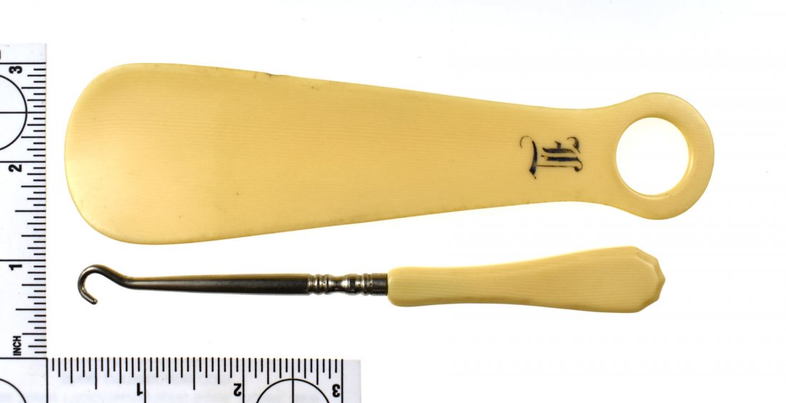 Vintage Personal Goods - Shoehorn/Garter Hook: Nice set of a vintage shoehorn and a garter/boot hook for stockings/socks/shoes. Synthetic Ivory made from Resin. Shoe horn is monogrammed with a L