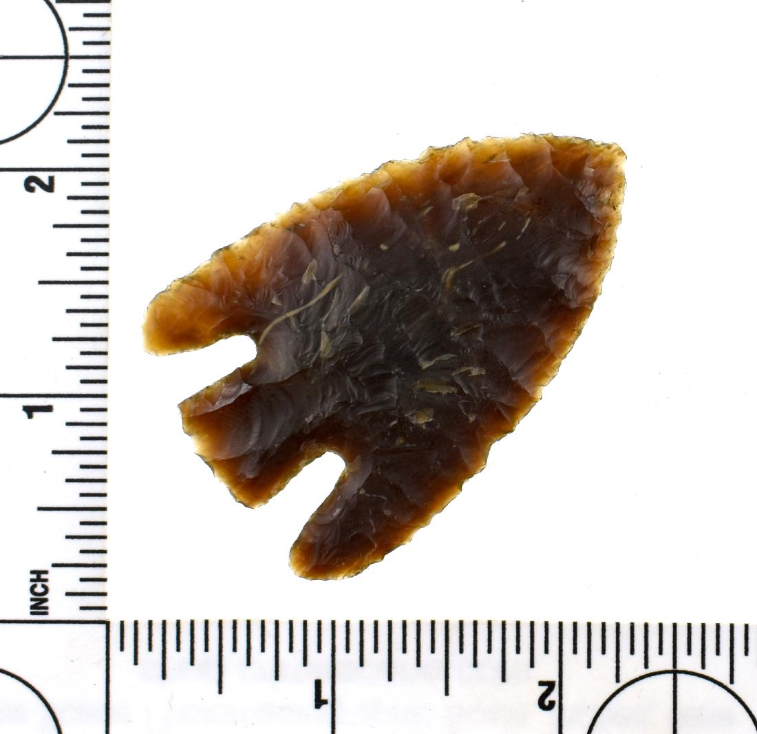 2 5/16" Reproduction Castroville: Root beer agate. Reproduction As-is.