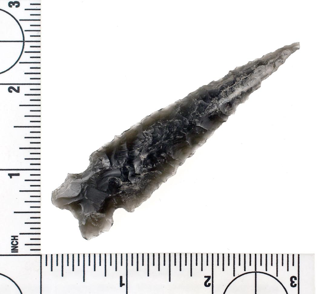 3 3/8" Stockton Side Notch: Obsidian example from a Stockton Site with heat damage. Rare.