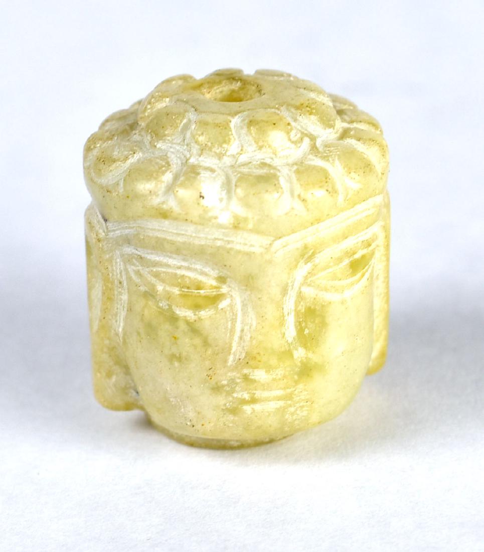 1 1/8" Buddha Head Bead: Light green stone example. Unknown age