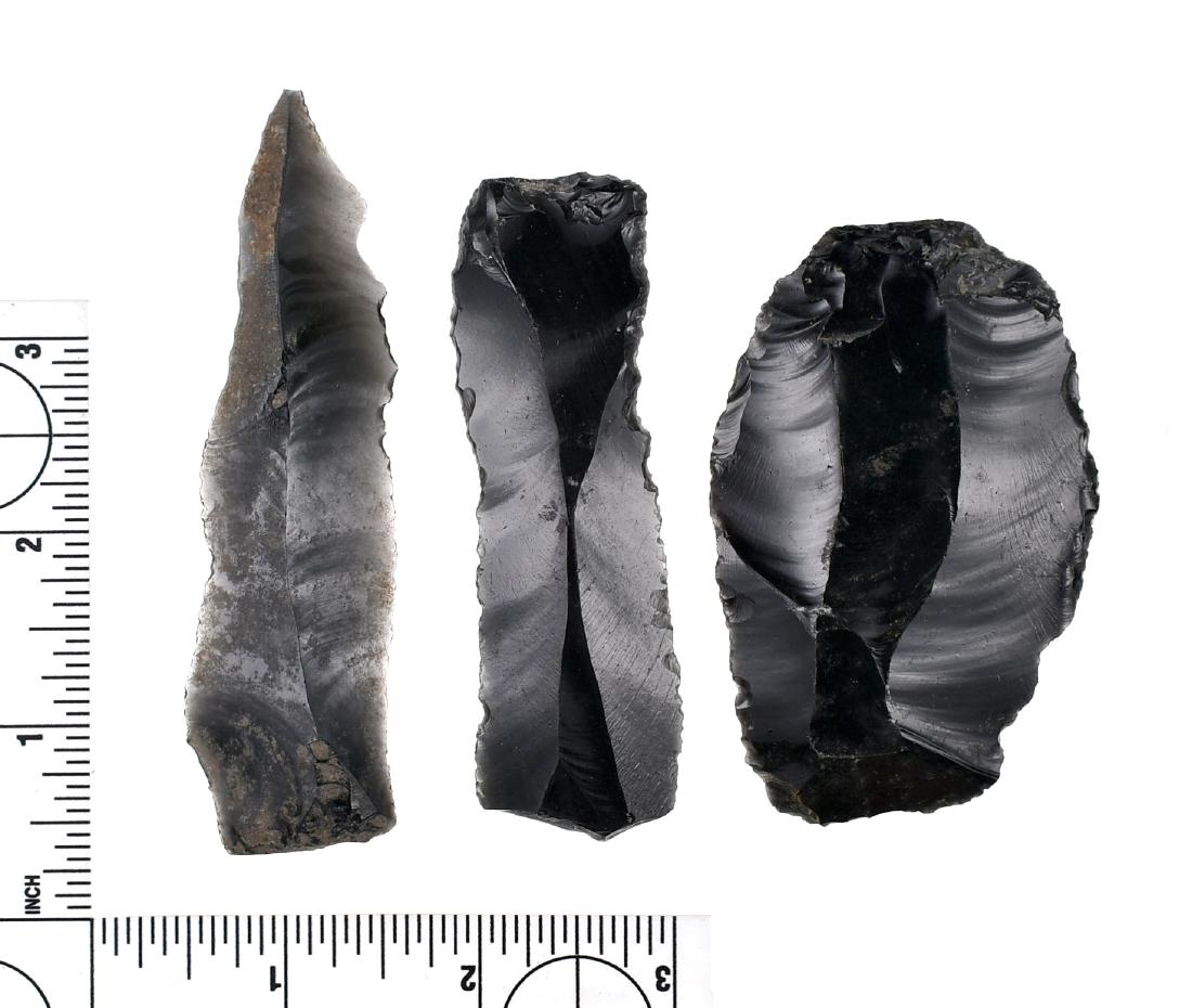 Cache of Early Obsidian Tools: Two translucent (3 3/8" & 3 7/8") uniface bladelets and one large 3" 'fluted(?) scraper. All reportedly found together. Ex- Heflin Collection.