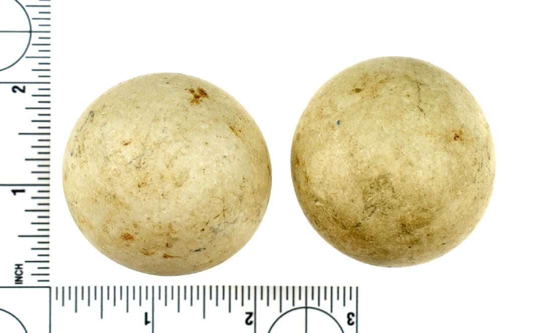 Pair of Game Balls: Pair of stone game balls from a Kentucky estate.