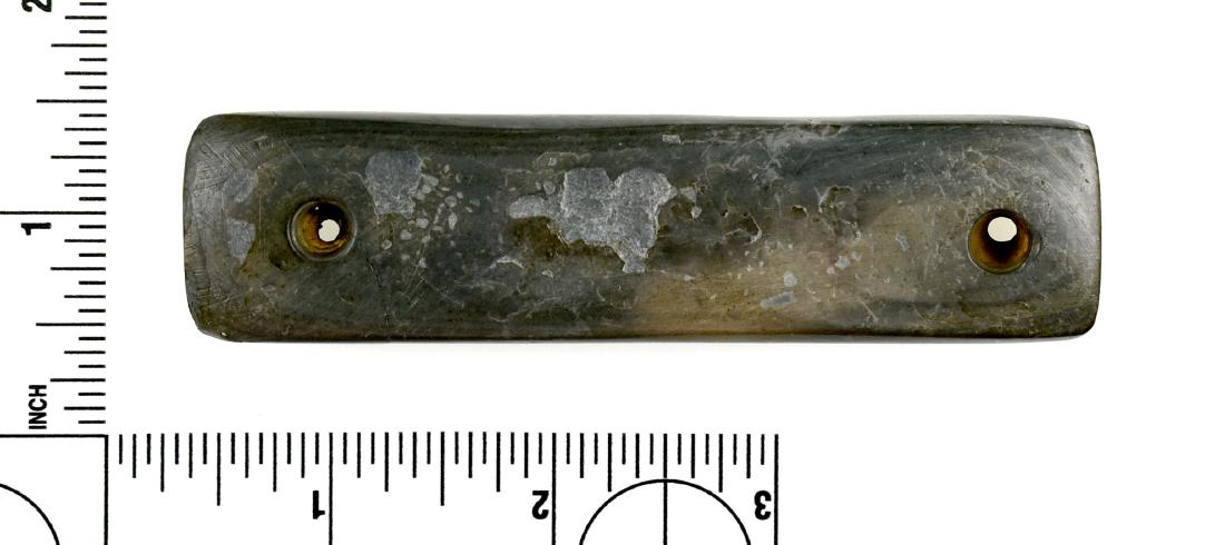 4" Banded Slate Gorget: Rectangular form. Polished over its entirety. Some ag damage and surface losses. Also broken and glued at one end through the hold which is hard to see. Still all in all a fine example of the type. Fo
