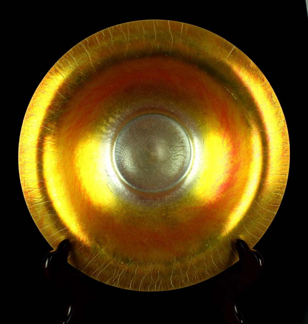 Large 9 3/4" Antique Steuben Aurene Art Glass Camellia: Gorgeous. The iridescent gold exterior shades to reddish-gold in the center. The exterior of classic Calcite white. Diameter 9 3/4". Height 2 1/4". Flawless condition. Unsigned. Early 1900's.