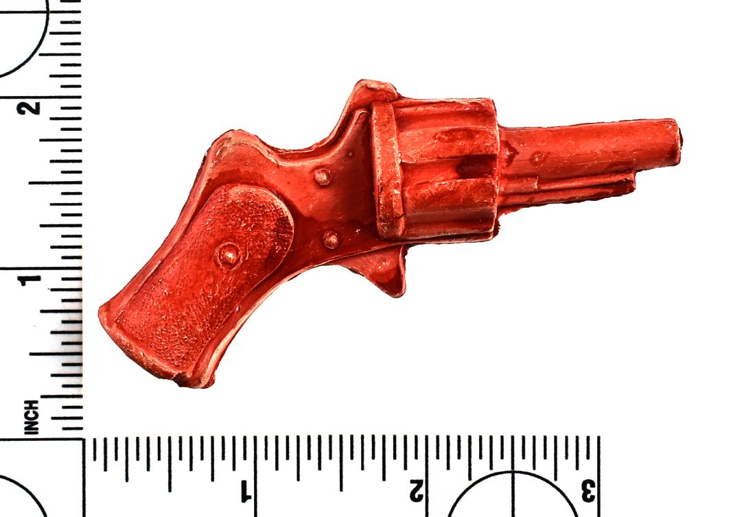 Unusual Revolver Clay Pipe: In the style of an early Civil-War Era Lefaucheux Revolver. White clay with red glaze. Unusual! Never seen one of these.