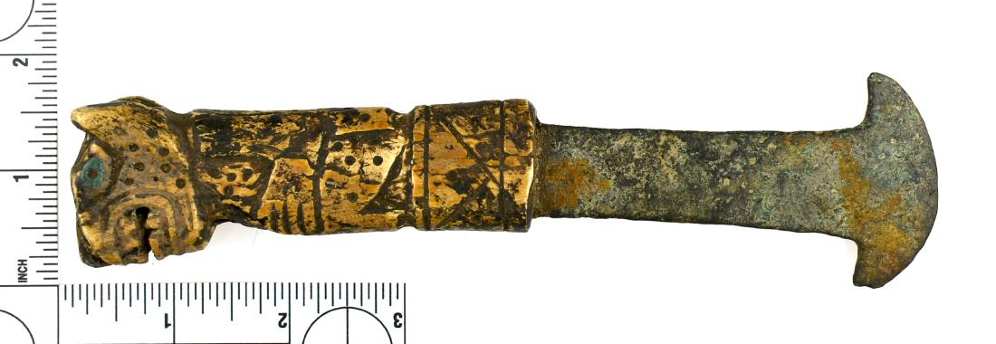 7 3/8" Incan Jaguar Effigy Knife - Stermer COA: Amazingly well preserved Bone handled knife in the form of a jaguar with inlaid turquoise eyes hafting a copper blade. Found in 1960 near Pisac, Peru. Sale highlight!