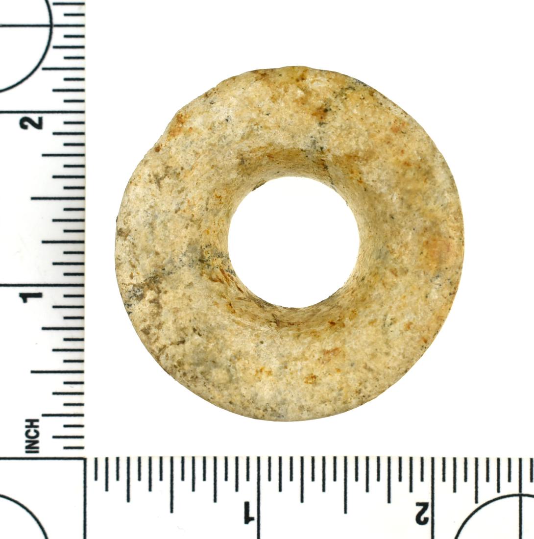 1 15/16" Mayan Jade Earspool: Excellent example with heavy calcification and root tracks. Ex California Collection.
