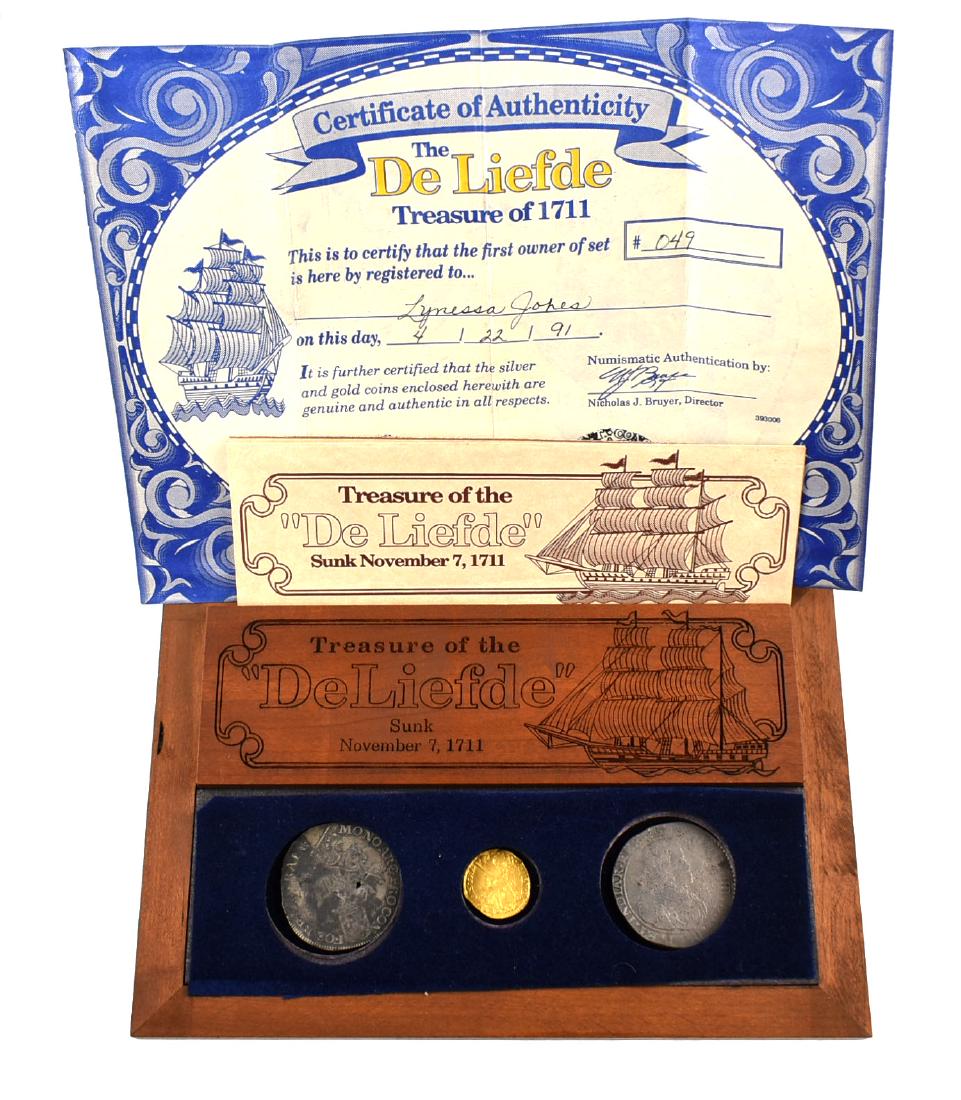 Gold and Silver Shipwreck Coins - COA: 1711 Gold Ducat, and 2 Silver Ducatons from the De Liefde Treasure of 1711. Includes engraved presentation box and COA along with information about the shipwreck.