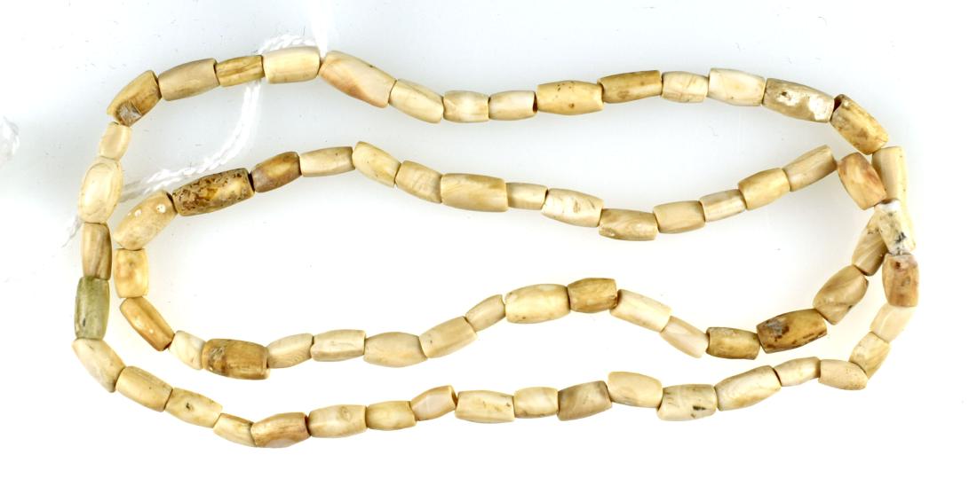 22.5" Spiro Beads: Recovered by Pocola Mining Company at Craig Mound. Ex Granger et al collections. Shell.