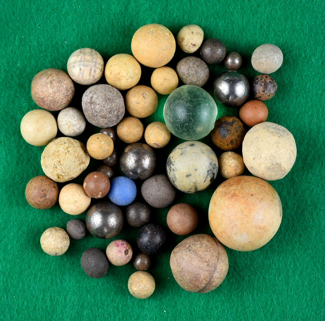 Large bag of Pioneer/Vintage Marbles: All found by Ken Broughton in Carter Co., Kentucky. Assortment of material types, sizes, and styles. Weighs 1lb 1oz.