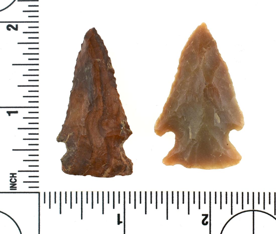 Pair of Fine KY Carter Cave Hardins: Great colors and craftsmanship. One is a 1 3/4" opaque example which exhibits vertically streaked reds, browns, and yellows. Really pretty. The other is also 1 3/4", caramel colored, and hig