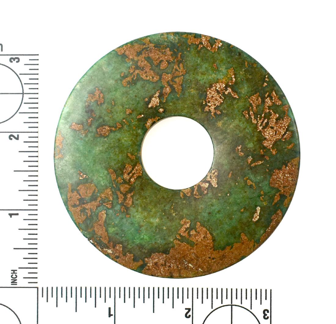 3 1/8" Chinese Greenstone Bi: Deep emerald green stone of unknown age.