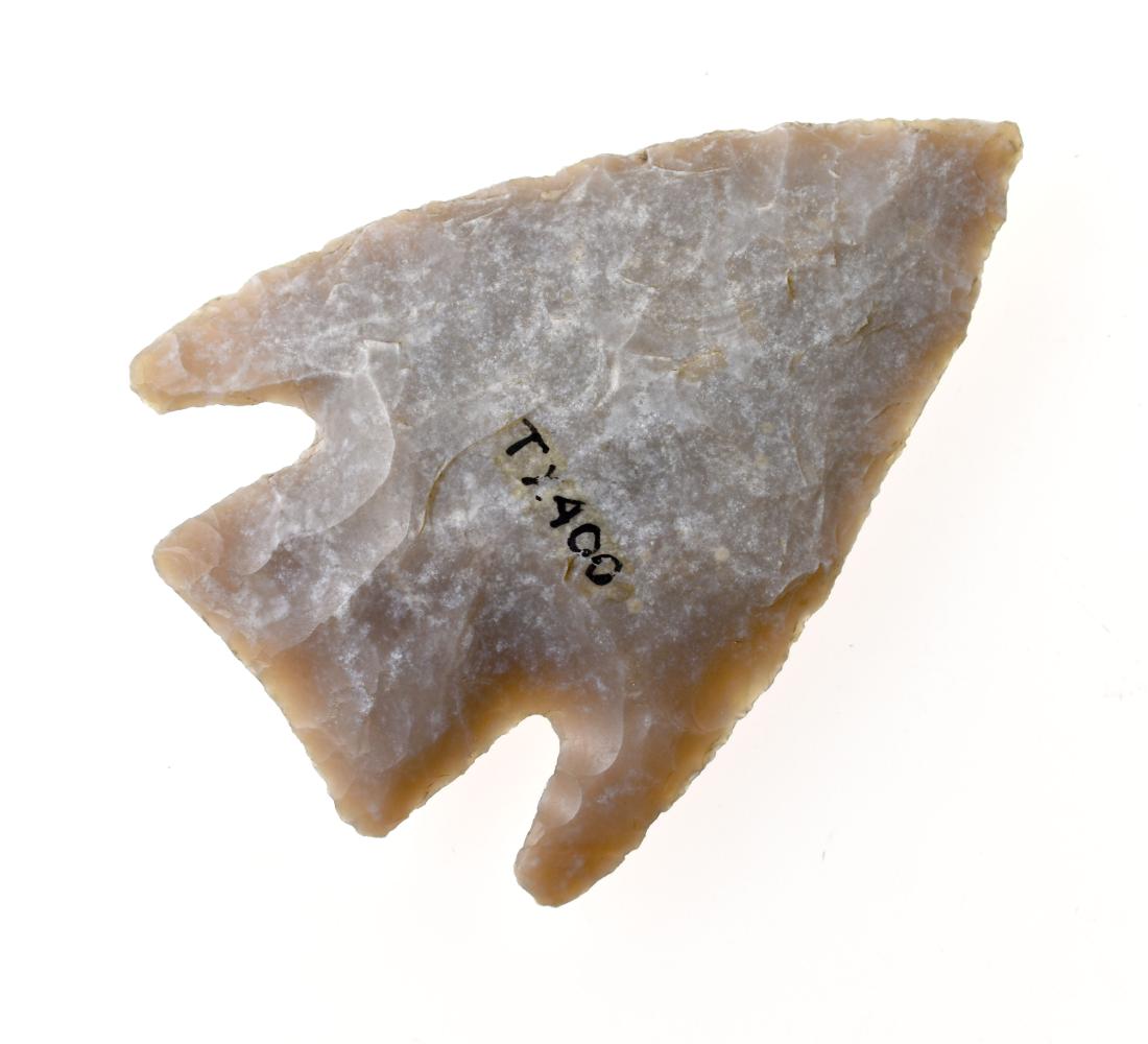 Superb 2 5/16" Castroville: Well patinated Edwards Plateau Chert example from Travis Co., Texas. Great symmetry and fabulous translucency laced with white desert blanching.