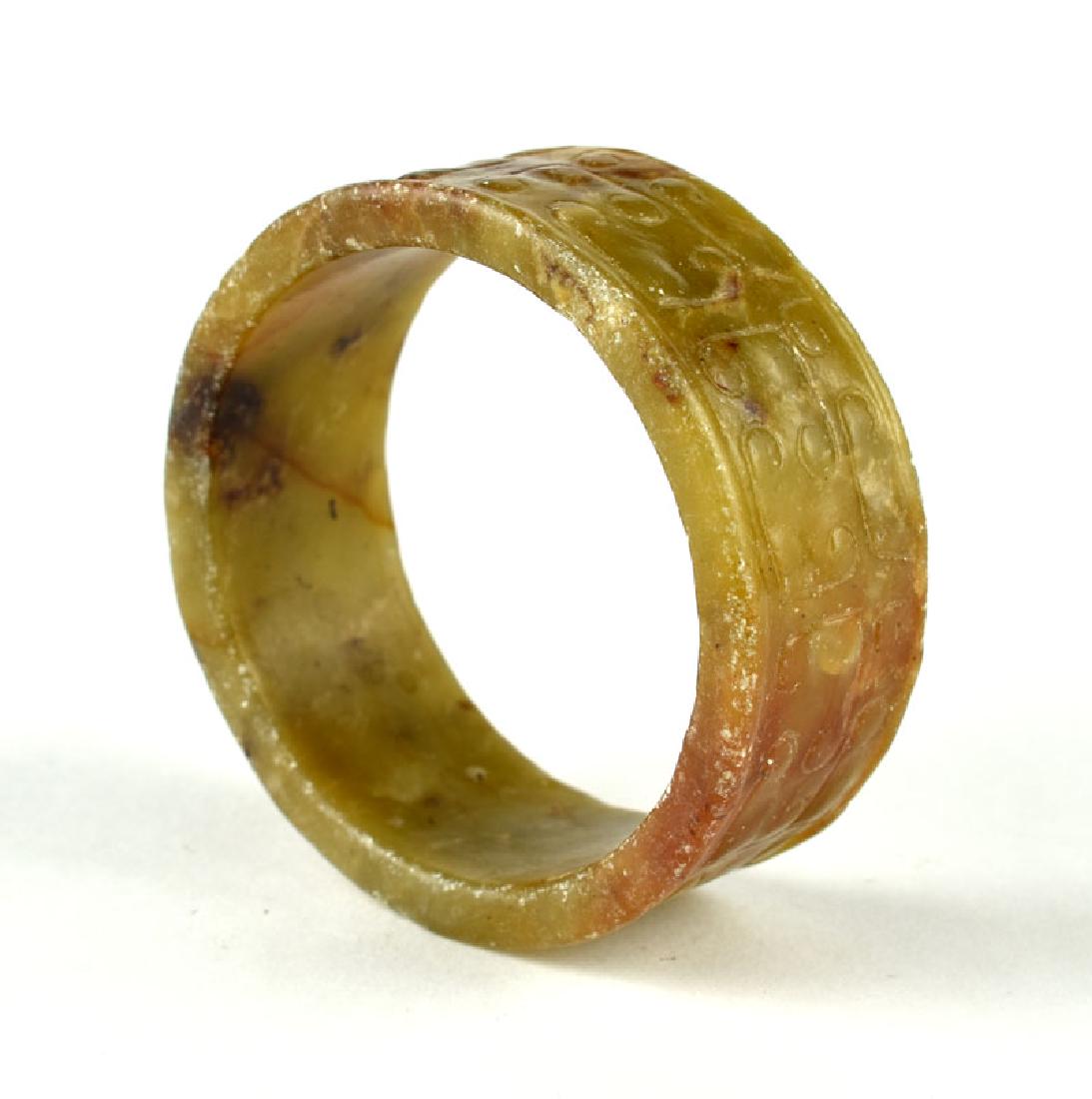 LATE NEOLITHIC OR EARLY SHANG DYNASTY JADE RING / (1 of 4)