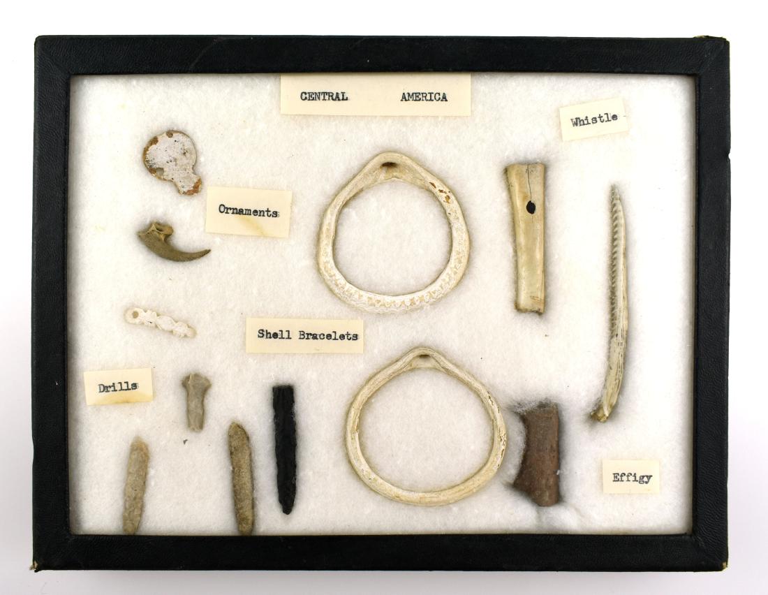 Display of Central American Artifacts: Ornaments of shell, bone, stingray spine, along with drills of variety of materials. Includes 8.75x6.75" Display. Ex Dr. Paul Park Collection.