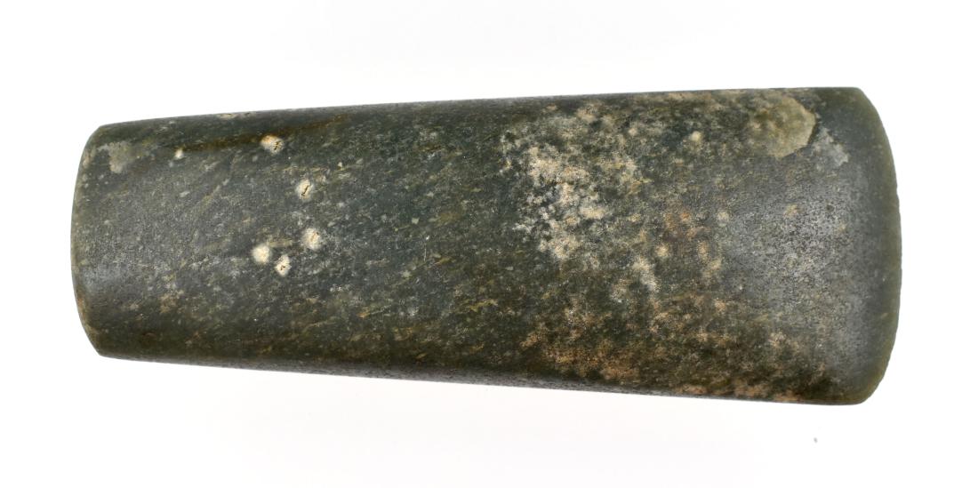 Fine 4 3/8" Mayan Jade Celt: Pre-Columbian, Mayan Territories, ca. 500 A.D. Rich green Jade. Highly polished over its entirety. Perfect form and symmetery. Fine undamaged bit. About as good as they get.