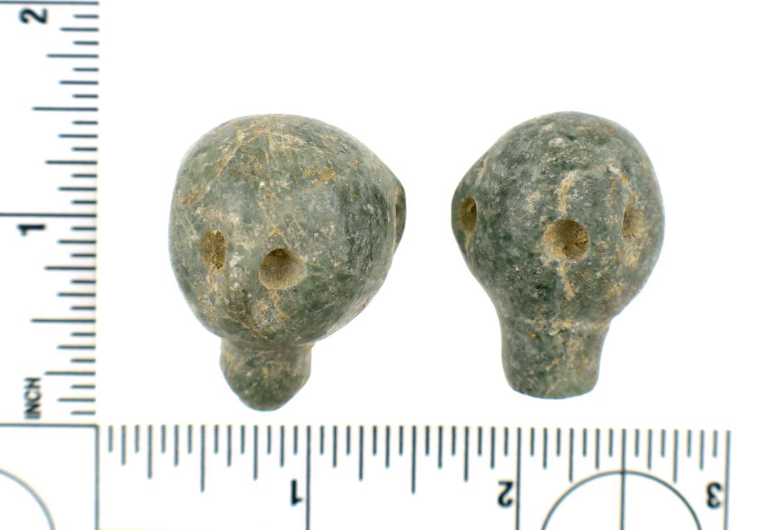 Unique Pair of Mayan Jade Effigy Beads: Not certain what they depict. Water bottles, bottle stoppers, earrings, human headsm trilobate faces, aliens??? Just don't know. Each is meticulously biconically drilled three times around their perim