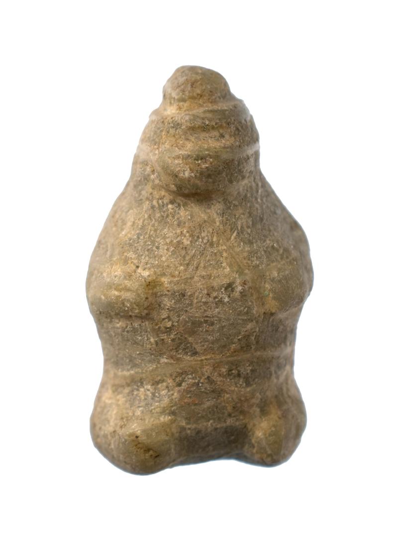 Mayan Jade Human Effigy Pendant: Pre-Columbian. Mayan Territories. Classic Period. ca. 250-900. Seated full bodied human form Effigy Pendant. Measures 1 1/4" x 5/8".