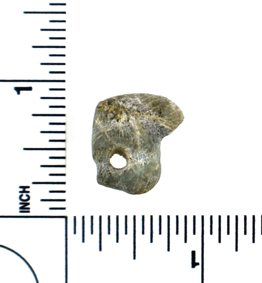 Pre-Columbian Mayan Effigy Bird Head Bead: Mayan Culture, ca. 600-900 A.D. Made of heavily calcified green Jade and drilled for suspension. Very nice. Measures 3/4" long and weighs 3.3 grams. Obviously wearable if desired. Ex- Malter Gall